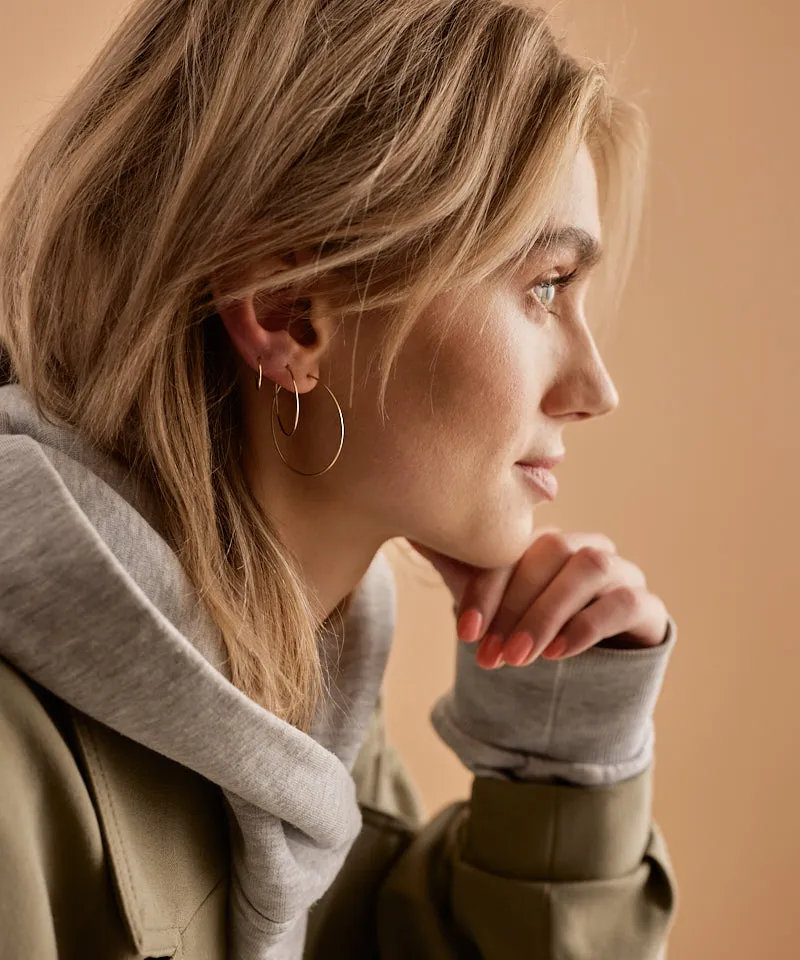 Blomdahl Ear Ring øreringer 12 mm gull titan
